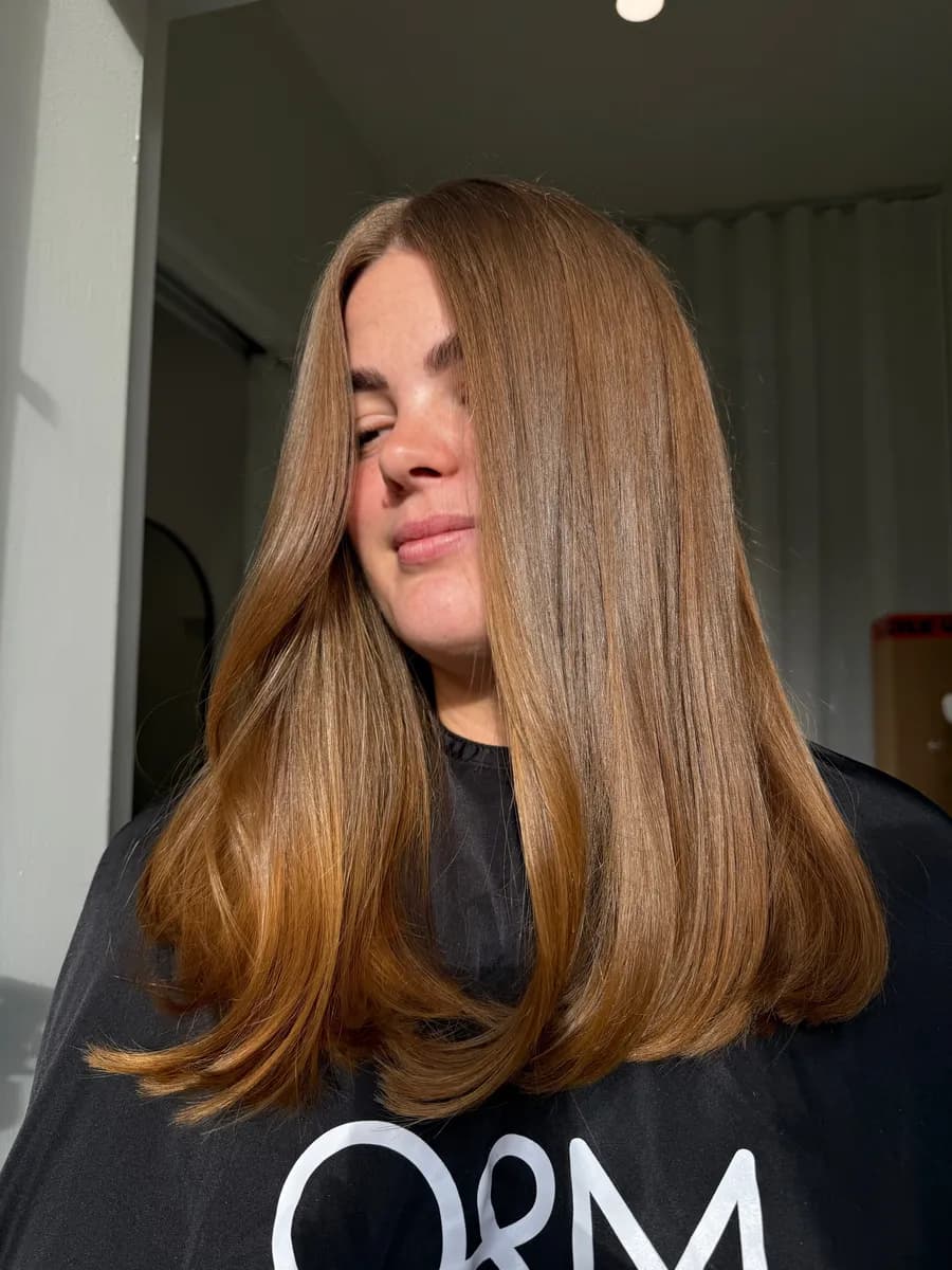 Long thick hair with colour-matched weft extensions