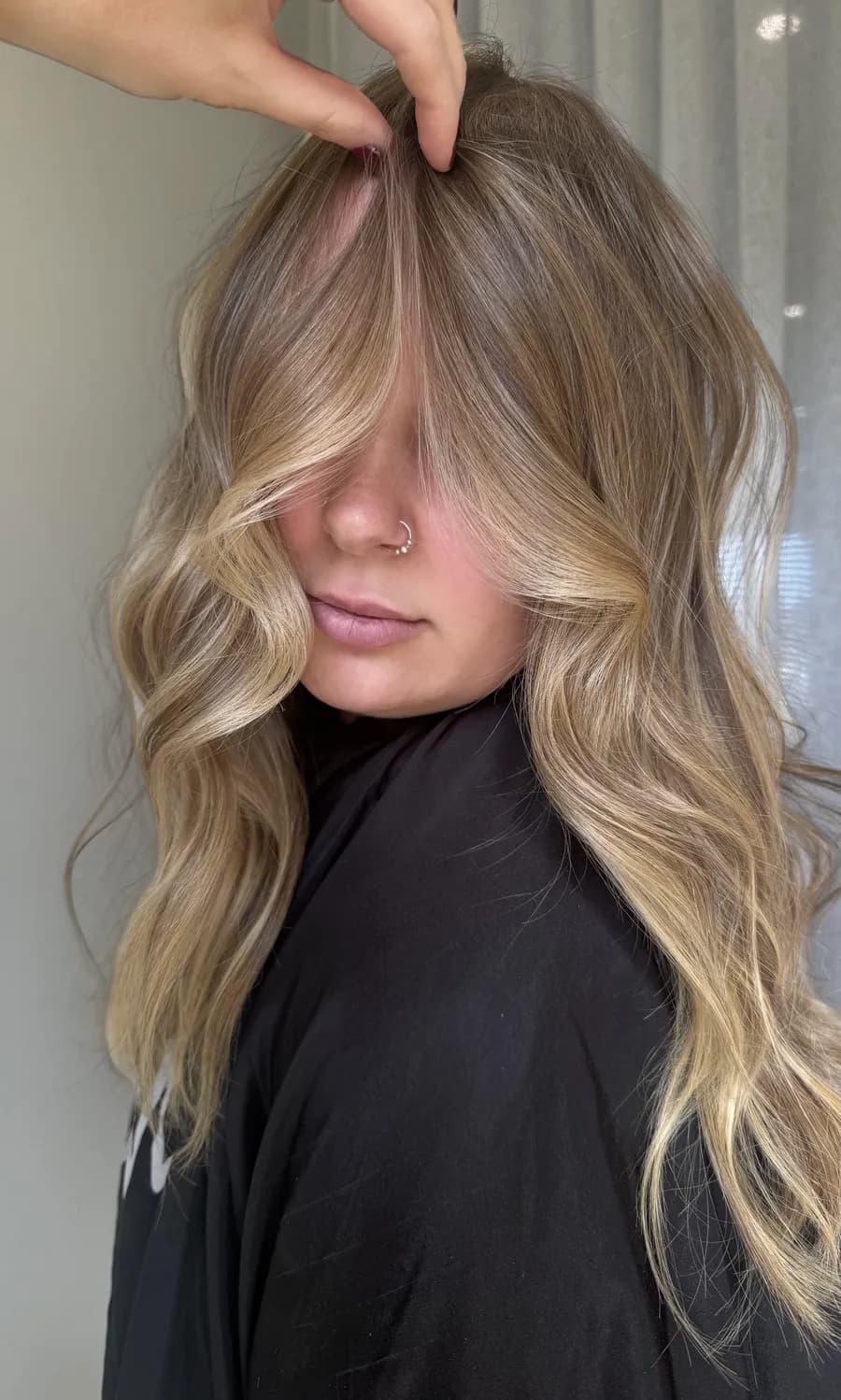Hand-painted balayage detail showing a soft blend
